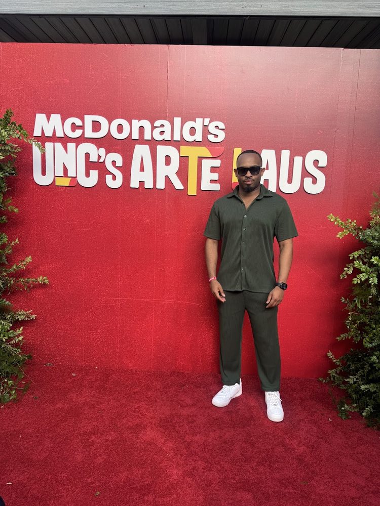 Trevor Queen at the McDonald's Unc's Arte Haus carpet